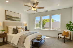 Bedroom featuring light colored carpet, ceiling fan, recessed lighting, and a mountain view