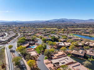 Aerial perspective of suburban area featuring a water and mountain view