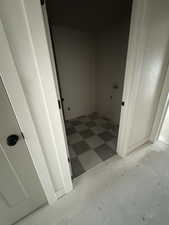 Corridor with tile patterned floors