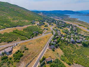 Aerial perspective of suburban area with a mountain backdrop