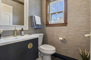 Bathroom featuring vanity and toilet
