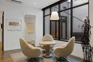 Sitting room with an AC wall unit