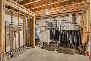 Miscellaneous room with concrete floors