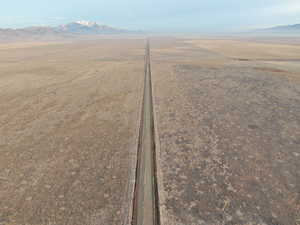 Overview of rural landscape with a mountain backdrop