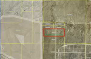 Aerial map of property and surrounding area featuring property parcel outlined