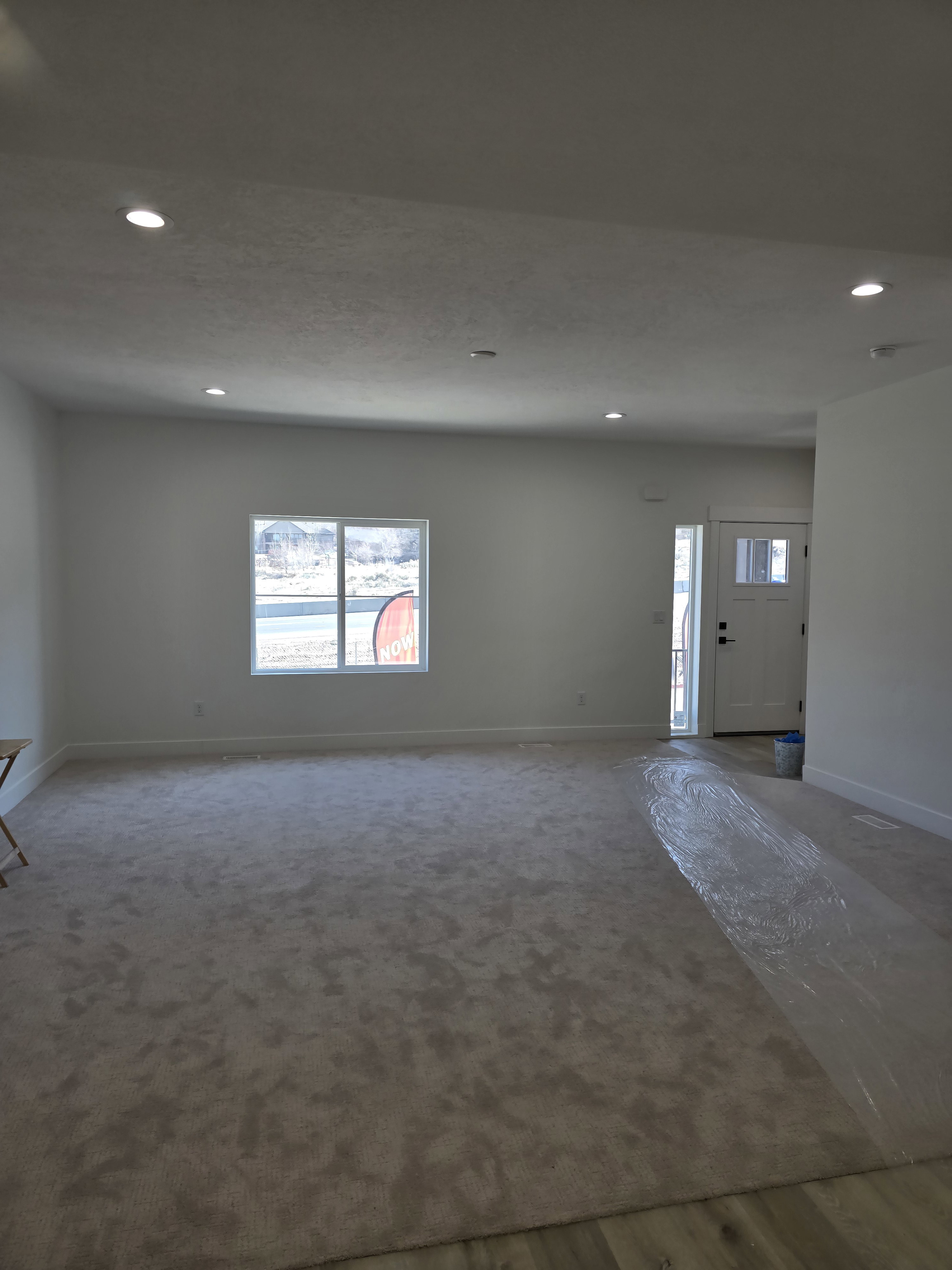 Living room featuring plenty of natural light and recessed lighting
