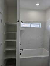 Full bathroom with tub / shower combination and recessed lighting