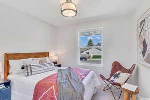 Bedroom with carpet flooring and baseboards