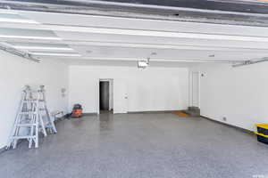 Garage featuring baseboards