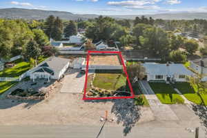 View of subject property featuring property parcel outlined and mountains