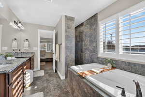 Garden tub and roman walk-in shower.