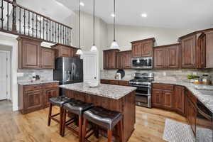 Stainless steel appliances, granite counter tops.
