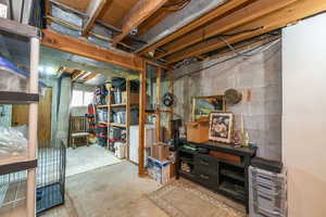 Unfinished basement with washer / dryer