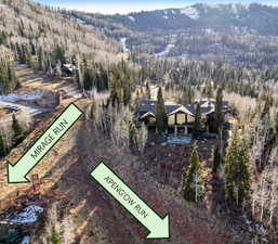 View from above of property featuring a forest