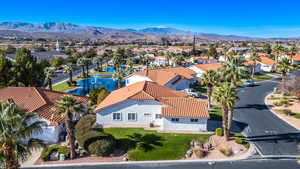 Aerial view of residential area with a mountainous background