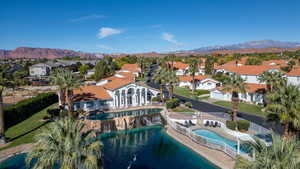 View of Clubhouse, ponds, pool and mountains