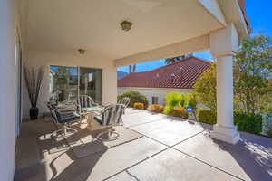 View of patio / terrace w/sliding doors to primary bedroom