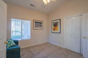 3rd Bed/Deb with lofted ceiling, carpet, and ceiling fan