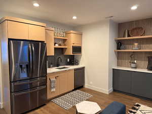 Bar featuring open shelves, stainless steel appliances, dark wood-style flooring, modern cabinets, and recessed lighting