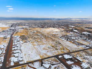 Snowy aerial view with a residential view