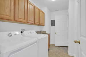 Laundry room with sink