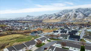 Aerial view of residential area with a mountain backdrop