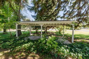 View of home's community featuring a lawn