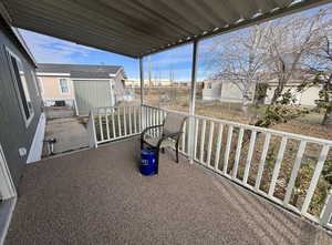 Fenced backyard featuring a residential view