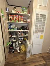 Storage area featuring a heating unit