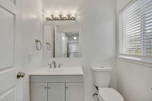 Bathroom with vanity and toilet
