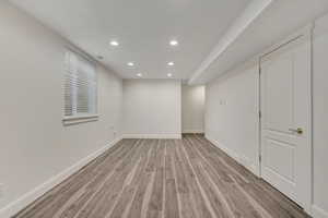 Unfurnished room featuring recessed lighting and light wood-style flooring