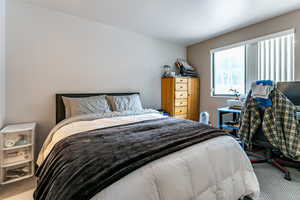 View of carpeted bedroom