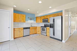 Open Kitchen with a Pantry and New Tile Floors