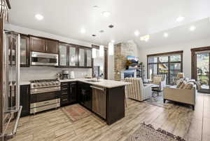 Open-concept living space with wood-finish flooring throughout
