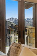 Mountain scenery framed by double doors