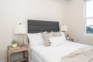 Bedroom with baseboards