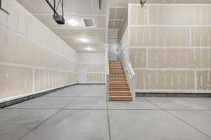 Garage featuring a garage door opener