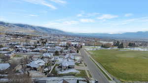 Aerial view of residential area with a mountain backdrop
