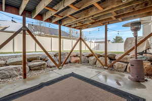 Fenced backyard featuring a patio