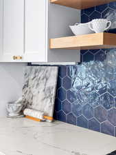 Kitchen view of white cabinets