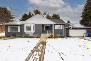 View of front of property featuring brick siding