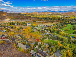 Aerial view of residential area with a mountainous background