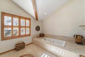 Full bathroom featuring wallpapered walls, tile patterned floors, a tub with jets, and recessed lighting