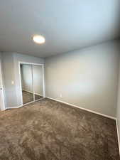 3rd bedroom view 2. showing mirrored closet doors