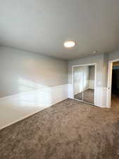 2nd bedroom view 2, showing mirrored closet doors