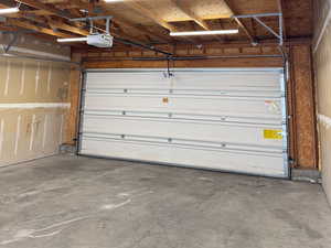 2 car garage, with a pull down ladder to access storage above