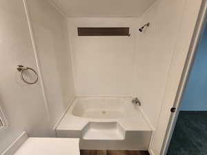 Bathroom with a textured ceiling