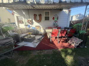 View of patio featuring an outdoor hangout area and outdoor dining space