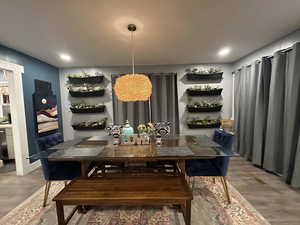 Dining space with wood finished floors