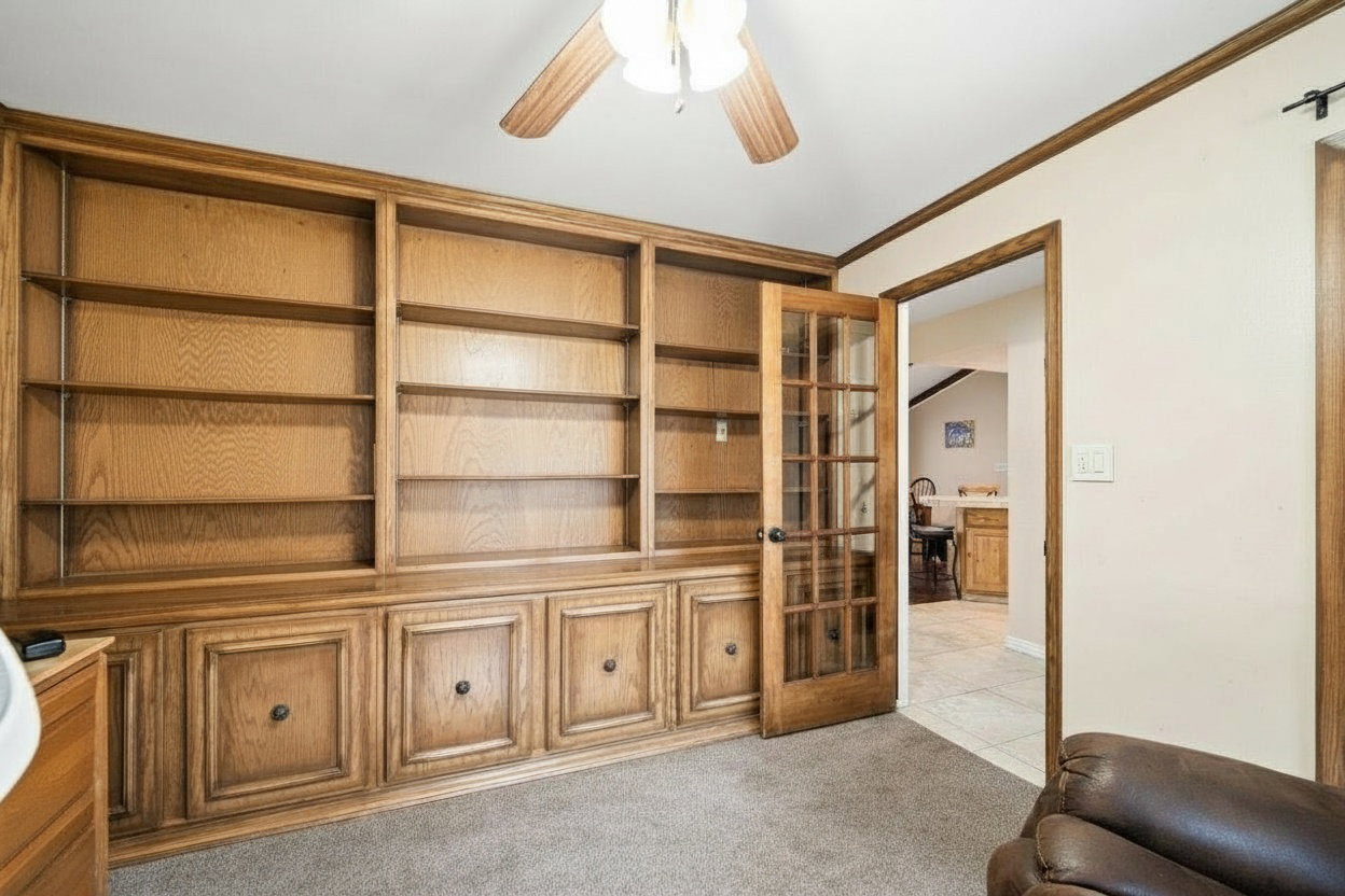 Built-in wood cabinetry with integrated shelving and lower storage